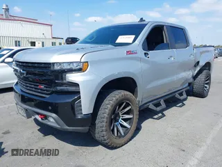 2019 Chevrolet Silverado 1500 LT Trail Boss with VIN 3GCPYFED9KG117659, listed as a IAAI auction lot 42128402 with 61,759 mi miles and . Bid and sale history available at DreamBid. Image 2.