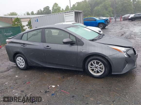 2016 Toyota Prius Two z VIN JTDKBRFU7G3000989, wystawiony jako IAAI lot #42345088 z przebiegiem 117 427 mil mil oraz . Historia ofert i sprzedaży dostępna na DreamBid. Obrazek 13.