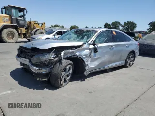 2018 Honda Accord EX-L with VIN 1HGCV2F52JA033754, listed as a Copart auction lot 63149805 with 61,923 mi miles and Salvage title. Bid and sale history available at DreamBid. Image 1.