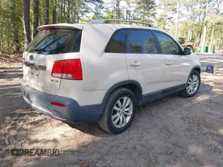 2011 Kia Sorento EX with VIN 5XYKU4A27BG011773, listed as a IAAI auction lot 42085204 with 292,692 mi miles. Bid and sale history available at carsss.com. Image 4.