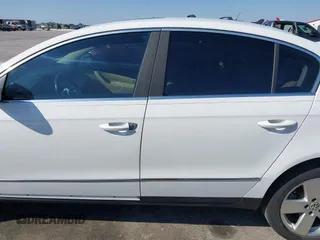2009 Volkswagen Passat z VIN WVWJK93C29P033434, wystawiony jako IAAI lot #41698532 z przebiegiem 129 256 mil mil oraz . Historia ofert i sprzedaży dostępna na DreamBid. Obrazek 14.