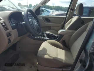 2007 Ford Escape XLS with VIN 1FMYU02Z27KB99534, listed as a Copart auction lot 66872184 with 107,072 mi miles and Salvage Title. Bid and sale history available at carsss.com. Image 7.