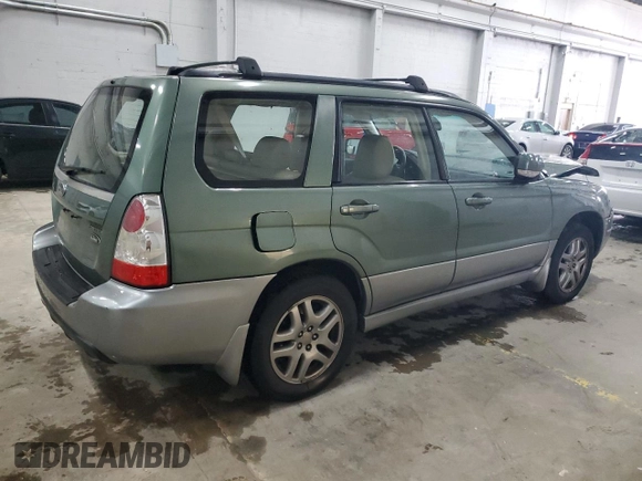 2007 Subaru Forester X L.L. Bean z VIN JF1SG67697H739094, wystawiony jako Copart lot #58479625 z przebiegiem 249 539 mil mil oraz Szkoda całkowita • Salvage title. Historia ofert i sprzedaży dostępna na DreamBid. Obrazek 3.