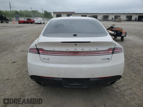 2015 Lincoln MKZ with VIN 3LN6L2J99FR602863, listed as a Copart auction lot 56679335 with 33,859 mi miles and Salvage title. Bid and sale history available at DreamBid. Image 6.