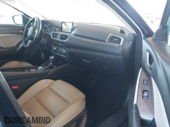 2016 Mazda 6 i Touring with VIN JM1GJ1T5XG1434388, listed as a IAAI auction lot 41528124 with 99,293 mi miles and . Bid and sale history available at DreamBid. Image 5.