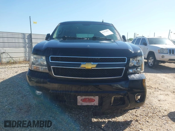 2014 Chevrolet Suburban LT with VIN 1GNSCJE00ER198703, listed as a IAAI auction lot 41952805 with 228,579 mi miles and . Bid and sale history available at DreamBid. Image 12.