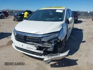 2023 Honda Odyssey Touring with VIN 5FNRL6H88PB003865, listed as a IAAI auction lot 41715384 with 40,765 mi miles and . Bid and sale history available at DreamBid. Image 2.