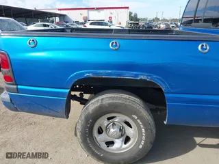 1999 Dodge Ram 1500 with VIN 3B7HC13Z2XG197088, listed as a IAAI auction lot 41686269 with 210,662 mi miles. Bid and sale history available at carsss.com. Image 6.