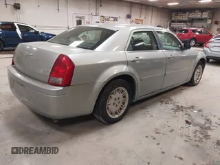 2005 Chrysler 300 with VIN 2C3JA43R55H569369, listed as a IAAI auction lot 41132751 with 123,253 mi miles. Bid and sale history available at carsss.com. Image 4.