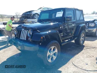2016 Jeep Wrangler Sahara with VIN 1C4AJWBG0GL174481, listed as a IAAI auction lot 41868149 with 59,300 mi miles and . Bid and sale history available at DreamBid. Image 17.
