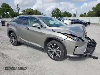 2017 Lexus RX 450h with VIN 2T2BGMCAXHC008829, listed as a Copart auction lot 61410365 with 70,463 mi miles and Salvage title. Bid and sale history available at DreamBid. Image 4.