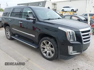 2018 Cadillac Escalade Premium Luxury z VIN 1GYS4CKJ1JR279129, wystawiony jako IAAI lot #42183231 z przebiegiem 130 086 mil mil oraz . Historia ofert i sprzedaży dostępna na DreamBid. Obrazek 1.