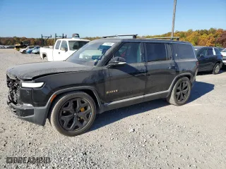 2022 Rivian R1S Launch Edition with VIN 7PDSGABL6NN001531, listed as a Copart auction lot 77143684 with 27,241 mi miles and Salvage Title. Bid and sale history available at carsss.com. Image 1.