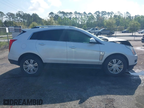 2013 Cadillac SRX Luxury Collection with VIN 3GYFNCE33DS608040, listed as a IAAI auction lot 41912860 with 128,295 mi miles and . Bid and sale history available at DreamBid. Image 13.