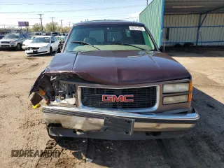 1997 GMC Suburban with VIN 3GKFK16R4VG518331, listed as a Copart auction lot 56241425 with 265,201 mi miles and Non repairable. Bid and sale history available at DreamBid. Image 5.
