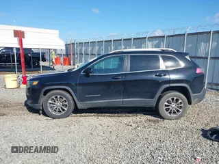 2019 Jeep Cherokee Latitude Plus with VIN 1C4PJMLBXKD229927, listed as a IAAI auction lot 42238552 with 90,984 mi miles and . Bid and sale history available at DreamBid. Image 14.