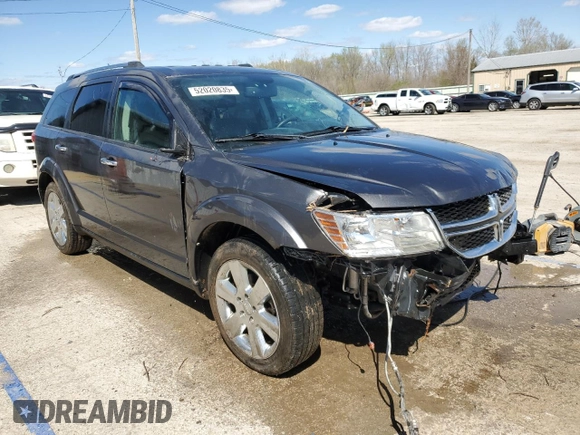 2014 Dodge Journey Limited with VIN 3C4PDDDG4ET202173, listed as a Copart auction lot 52020835 with 124,624 mi miles and Salvage Title. Bid and sale history available at carsss.com. Image 4.