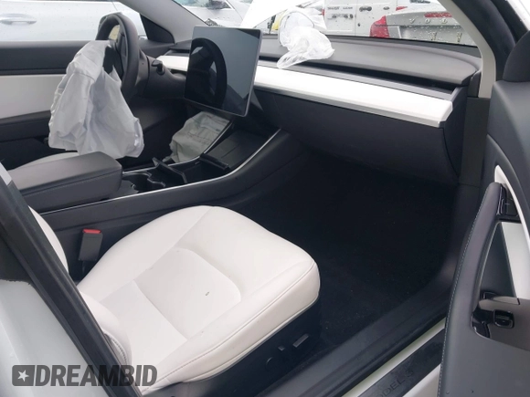 2020 Tesla Model 3 Standard Range Plus with VIN 5YJ3E1EA0LF741311, listed as a IAAI auction lot 41581931 with 43,284 mi miles. Bid and sale history available at carsss.com. Image 5.