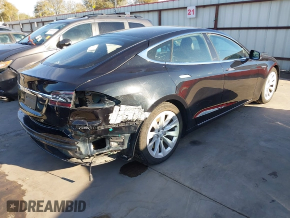 2017 Tesla Model S 60 with VIN 5YJSA1E19HF226094, listed as a IAAI auction lot 40931307 with 80,392 mi miles and . Bid and sale history available at DreamBid. Image 4.