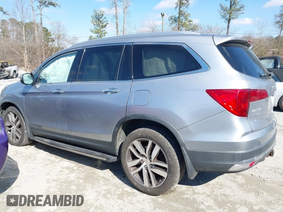 2017 Honda Pilot Touring with VIN 5FNYF6H94HB006873, listed as a IAAI auction lot 41618529 with 154,689 mi miles. Bid and sale history available at carsss.com. Image 14.