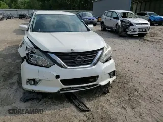 2016 Nissan Altima SV with VIN 1N4AL3AP0GC267131, listed as a Copart auction lot 53040465 with 122,308 mi miles and Salvage Title. Bid and sale history available at carsss.com. Image 13.
