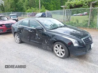 2014 Cadillac ATS Standard AWD z VIN 1G6AG5RX8E0113069, wystawiony jako IAAI lot #42192262 z przebiegiem 167 231 mil mil oraz . Historia ofert i sprzedaży dostępna na DreamBid. Obrazek 1.