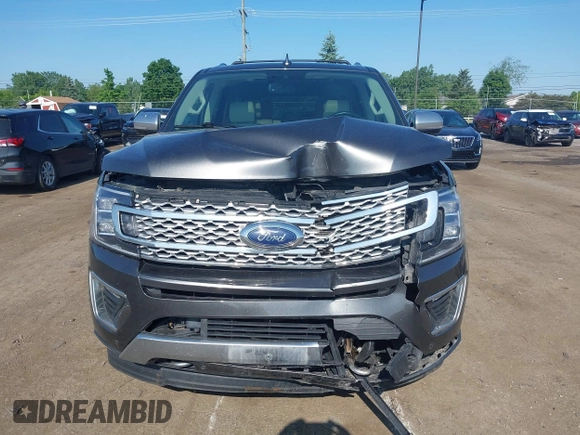2021 Ford Expedition Max Platinum with VIN 1FMJK1MT8MEA66311, listed as a IAAI auction lot 42450429 with 95,732 mi miles and . Bid and sale history available at DreamBid. Image 12.