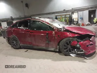 2023 Tesla Model X with VIN 7SAXCDE51PF403632, listed as a IAAI auction lot 41328722 with Not Provided miles and . Bid and sale history available at DreamBid. Image 12.