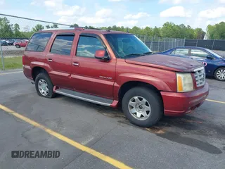 2003 Cadillac Escalade z VIN 1GYEK63N53R183593, wystawiony jako IAAI lot #42438258 z przebiegiem 74 561 mil mil oraz . Historia ofert i sprzedaży dostępna na DreamBid. Obrazek 1.