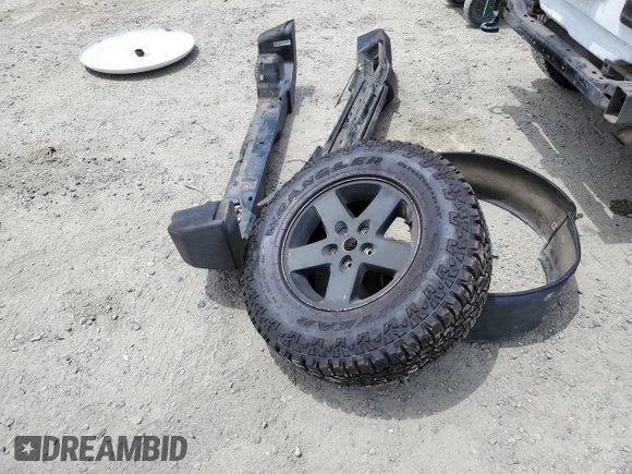2013 Jeep Wrangler Unlimited Sport with VIN 1C4BJWDG8DL639781, listed as a Copart auction lot 63620025 with 84,720 mi miles and Salvage title. Bid and sale history available at DreamBid. Image 12.
