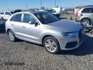 2018 Audi Q3 Premium z VIN WA1ECCFS0JR013832, wystawiony jako IAAI lot #42007550 z przebiegiem 60 935 mil mil oraz . Historia ofert i sprzedaży dostępna na DreamBid. Obrazek 1.