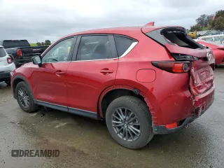 2021 Mazda CX-5 Touring with VIN JM3KFACM8M0406987, listed as a Copart auction lot 45241535 with 57,673 mi miles and Salvage Title. Bid and sale history available at carsss.com. Image 2.