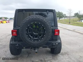 2018 Jeep Wrangler Unlimited Sport S with VIN 1C4HJXDG2JW228483, listed as a IAAI auction lot 41710364 with 56,970 mi miles. Bid and sale history available at carsss.com. Image 16.