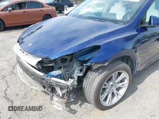 2023 Tesla Model Y Long Range z VIN 7SAYGDEE5PA102285, wystawiony jako IAAI lot #42402981 z przebiegiem 24 550 mil mil oraz . Historia ofert i sprzedaży dostępna na DreamBid. Obrazek 6.