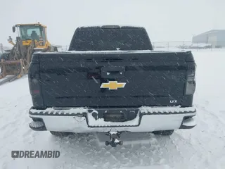 2014 Chevrolet Silverado 1500 LTZ with VIN 3GCUKSEC5EG291026, listed as a IAAI auction lot 41286574 with 124,615 mi miles and . Bid and sale history available at DreamBid. Image 16.