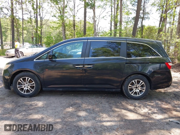 2013 Honda Odyssey EX-L with VIN 5FNRL5H69DB025040, listed as a IAAI auction lot 42078699 with 181,470 mi miles and . Bid and sale history available at carsss.com. Image 14.