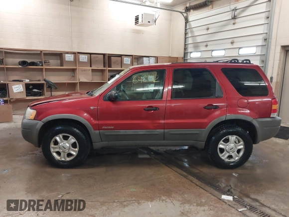 2001 Ford Escape XLT with VIN 1FMYU04101KF46809, listed as a IAAI auction lot 41664202 with 256,468 mi miles. Bid and sale history available at carsss.com. Image 14.