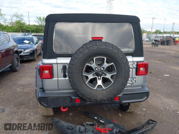 2021 Jeep Wrangler Unlimited Rubicon with VIN 1C4HJXFNXMW560512, listed as a IAAI auction lot 42124812 with 18,034 mi miles and . Bid and sale history available at DreamBid. Image 17.
