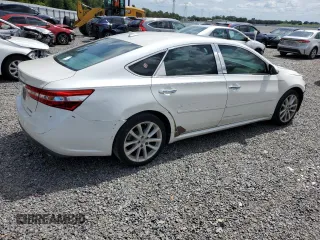 2013 Toyota Avalon XLE with VIN 4T1BK1EB2DU061038, listed as a Copart auction lot 63974195 with 122,432 mi miles and Salvage title. Bid and sale history available at DreamBid. Image 3.
