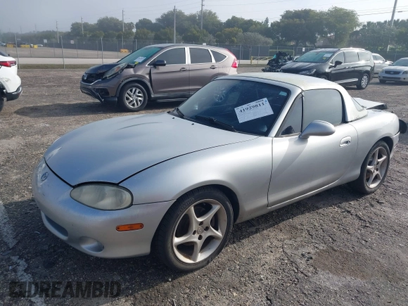 2003 Mazda MX-5 Miata Cloth with VIN JM1NB353730311899, listed as a IAAI auction lot 41929811 with 99,589 mi miles and . Bid and sale history available at DreamBid. Image 17.