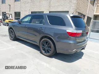 2013 Dodge Durango SXT with VIN 1C4RDHAG3DC694256, listed as a IAAI auction lot 42431904 with 152,321 mi miles and . Bid and sale history available at DreamBid. Image 3.