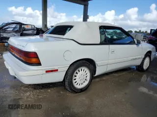 1995 Chrysler LeBaron z VIN 1C3EU4531SF671668, wystawiony jako Copart lot #74679224 z przebiegiem 77 023 mil mil oraz Nie do naprawy. Historia ofert i sprzedaży dostępna na DreamBid. Obrazek 3.