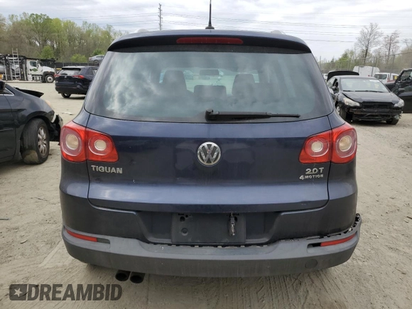 2011 Volkswagen Tiguan SE with VIN WVGBV7AX8BW523969, listed as a Copart auction lot 52463575 with 142,209 mi miles and Clean Title. Bid and sale history available at DreamBid. Image 6.