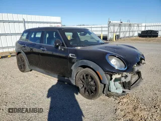 2017 MINI Clubman Cooper with VIN WMWLN5C53H2E32391, listed as a Copart auction lot 77231654 with 105,842 mi miles and Salvage Title. Bid and sale history available at carsss.com. Image 4.