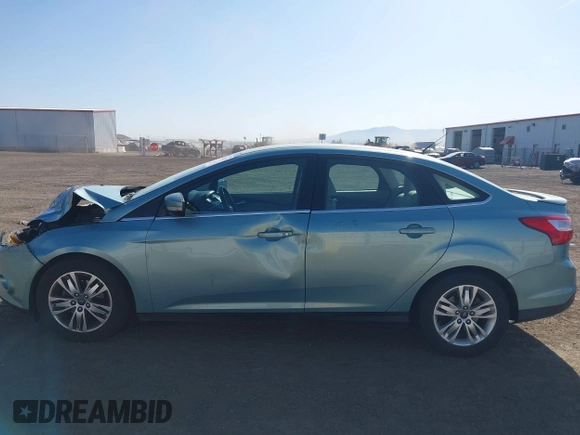 2012 Ford Focus SEL with VIN 1FAHP3H23CL417403, listed as a IAAI auction lot 42043152 with 140,604 mi miles. Bid and sale history available at carsss.com. Image 14.