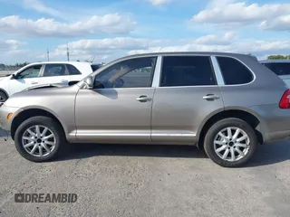2005 Porsche Cayenne S with VIN WP1AB29P75LA61263, listed as a IAAI auction lot 41635350 with 242,874 mi miles. Bid and sale history available at carsss.com. Image 15.