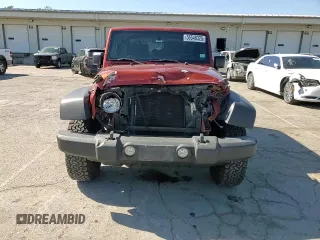 2014 Jeep Wrangler Rubicon with VIN 1C4BJWCG9EL285532, listed as a Copart auction lot 56548325 with 100,032 mi miles and Salvage title. Bid and sale history available at DreamBid. Image 14.