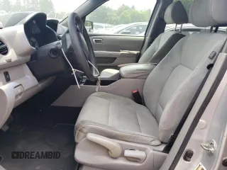 2009 Honda Pilot LX with VIN 5FNYF48259B040040, listed as a Copart auction lot 59860445 with 213,459 mi miles and Salvage title. Bid and sale history available at DreamBid. Image 7.