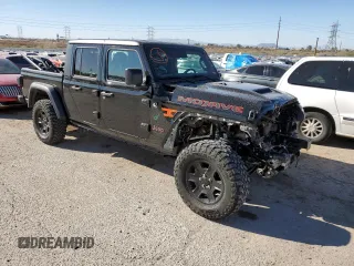 2020 Jeep Gladiator Mojave z VIN 1C6JJTEG1LL209606, wystawiony jako Copart lot #88265265 z przebiegiem 57 098 mil mil oraz Szkoda całkowita • Salvage title. Historia ofert i sprzedaży dostępna na DreamBid. Obrazek 4.