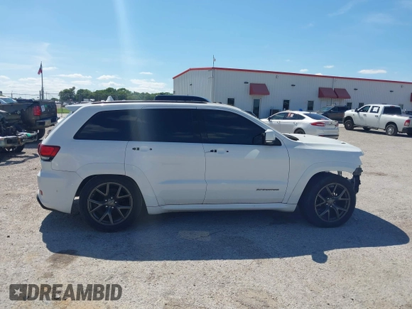 2020 Jeep Grand Cherokee Trackhawk with VIN 1C4RJFN96LC141513, listed as a IAAI auction lot 42386219 with Not provided miles and . Bid and sale history available at DreamBid. Image 13.